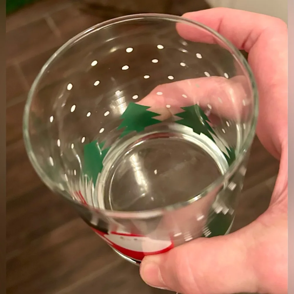 8 Crate & Barrel vintage skating Santa lowball glasses. 12oz